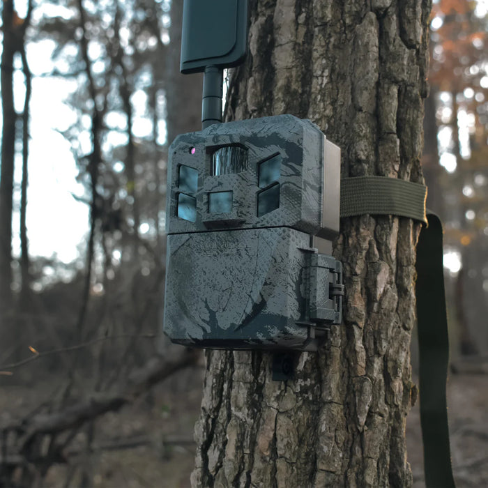 Spartan GoLive 3 trail camera mounted on tree with mounting strap. Easy installation 